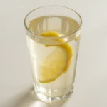Psyllium Husk Weight Loss Guide: Benefits, Recipes & Tips 4 Flat lay of psyllium husk powder, lemon, cinnamon, honey, and water on a clean background