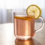 Japanese Pink Salt Recipe: A Mineral-Rich Drink for Daily Wellness 2 Japanese Pink Salt Recipe in glass mug on wooden table