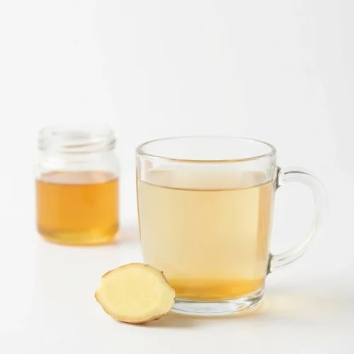 Canaan Honey For Memory: Safe Recipes And Real Brain Benefits 5 Canaan honey for memory drink in a glass mug with lemon on a white background