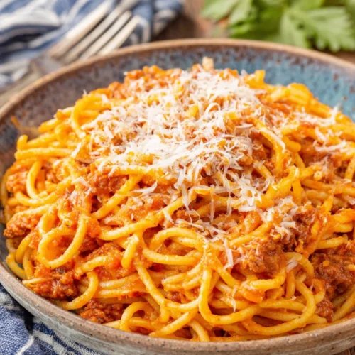 Delicious crockpot spaghetti with creamy sauce and Parmesan cheese