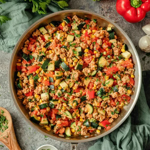 Delicious ground turkey skillet packed with veggies for quick weeknight dinners.