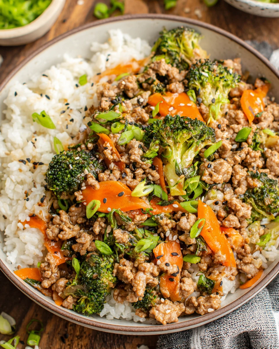 Savory Ground Turkey Teriyaki Bowl Ground turkey teriyaki with vegetables over rice, perfect for family dinners.