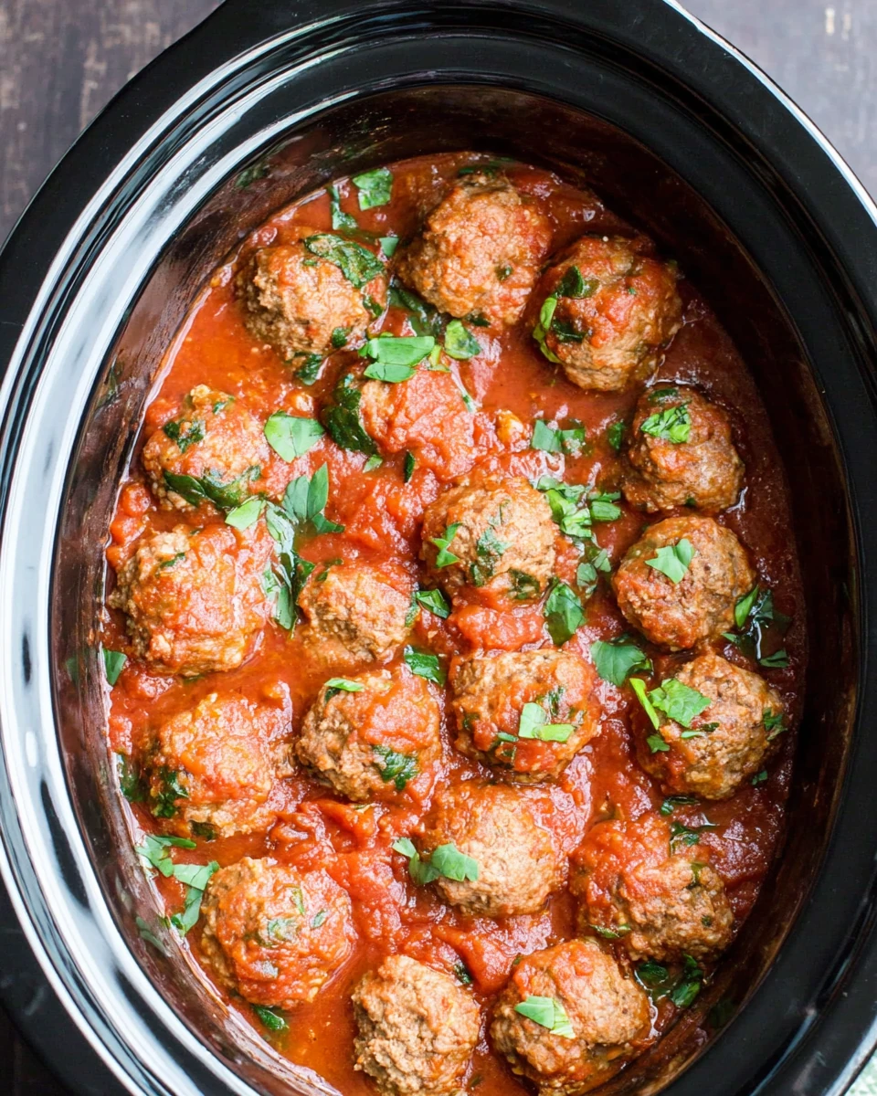 Juicy turkey meatballs simmering in marinara sauce, hearty and flavorful.