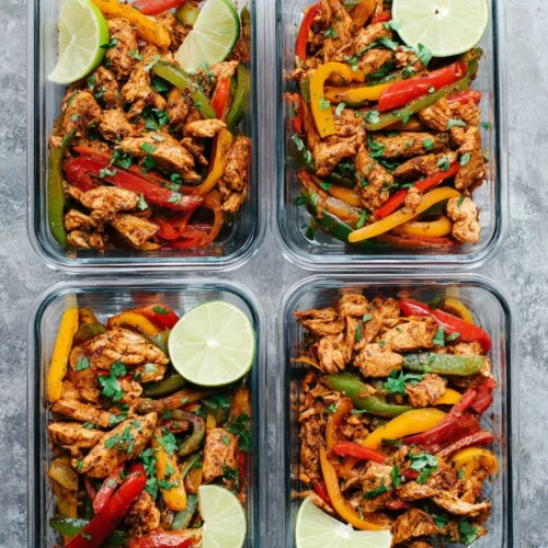 Chicken fajita meal prep with vibrant peppers ready for the week.