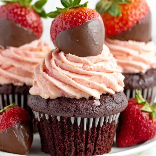 Chocolate covered strawberry cupcakes look delicious and inviting.