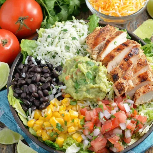 High Protein Burrito Bowl: A Deliciously Indulgent Meal 1 High protein burrito bowl packed with chicken, beans, and veggies.