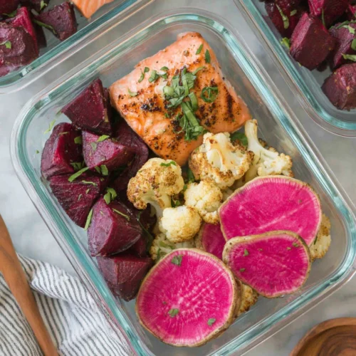 Meal prep salmon with veggies for healthy meals.