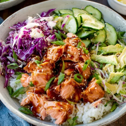 Delicious Salmon Rice Bowl: Healthy and Quick 1 Delicious salmon rice bowl with sriracha mayo.