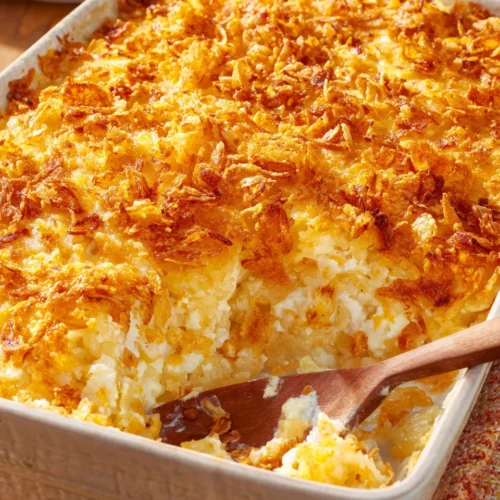 Cheesy hashbrown potato casserole with crispy topping