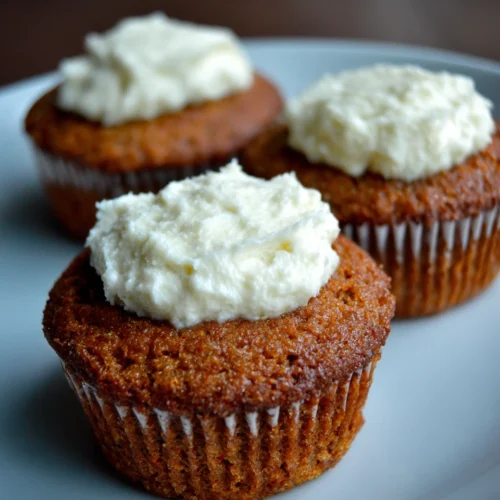 Easiest Carrot Cake Cupcakes: Deliciously Simple Treats 1 Easiest carrot cake cupcakes topped with cream cheese frosting.