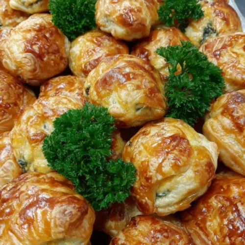 Savory ham cheese spinach puffs perfect for gatherings.