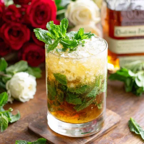 Mint Julep: A Refreshing and Inviting Cocktail 1 Mint julep cocktail with mint leaves, perfect for warm days.
