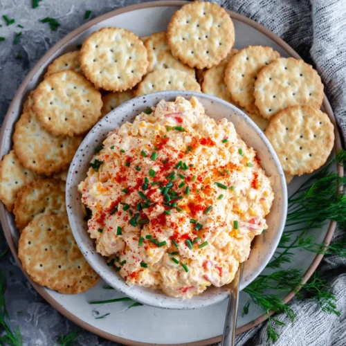 Pimento Cheese: A Creamy, Indulgent Delight 1 Delicious pimento cheese dip with crackers for parties.