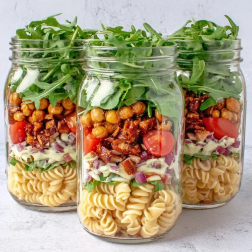 BLT Pasta Salad: A Deliciously Easy Meal 1 BLT pasta salad jars with vibrant ingredients.