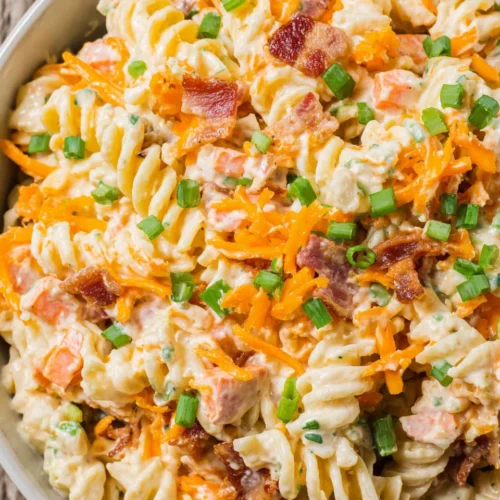 Cheddar Bacon Ranch Pasta Salad: A Delightful Treat 1 Cheddar bacon ranch pasta salad with fusilli noodles.