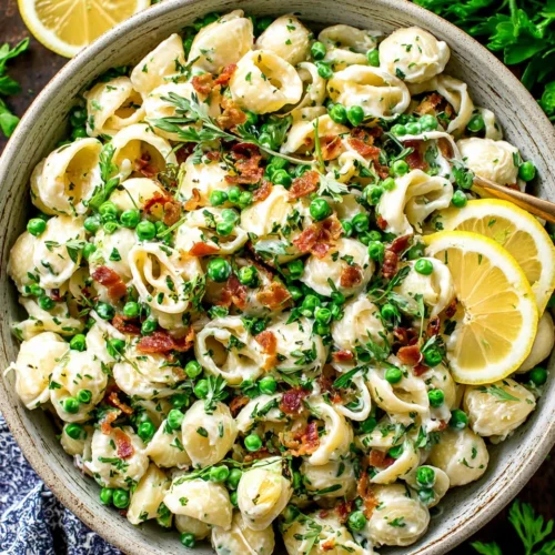 Creamy bacon pea pasta salad recipe that's perfect for any occasion.