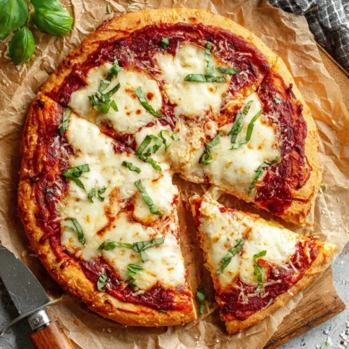 Gluten free margherita pizza with fresh mozzarella and basil on a wooden board