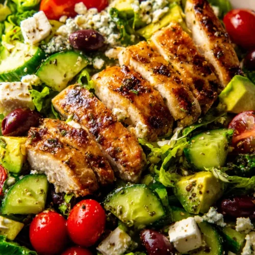 Delicious Grilled Chicken Salad: A Fresh and Easy Recipe 1 Grilled chicken salad with avocado, feta, cucumbers, and olives