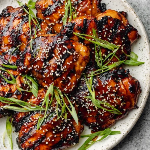 Homemade Teriyaki Sauce: A Simple & Delicious Recipe 1 Grilled chicken with homemade teriyaki sauce, sesame seeds, and green onions