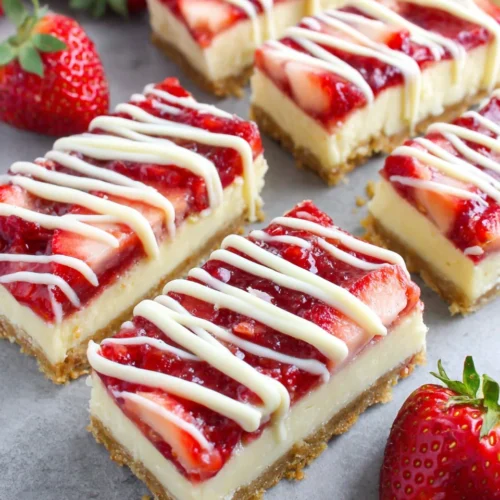 No-bake strawberry dream bars with creamy filling and fresh strawberries.