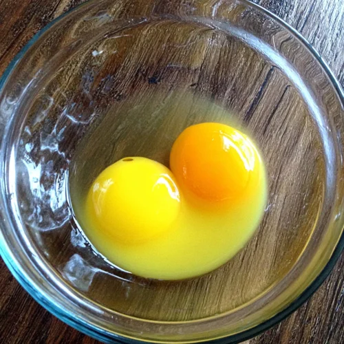 Egg yolks for old fashioned lemon ice box pie preparation.