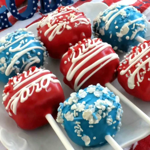 Easy 4th of July cookies decorated like American flags with red, white, and blue icing