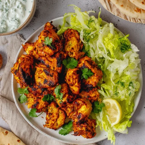 Easy chicken shawarma wrap with grilled chicken, pita, and fresh toppings