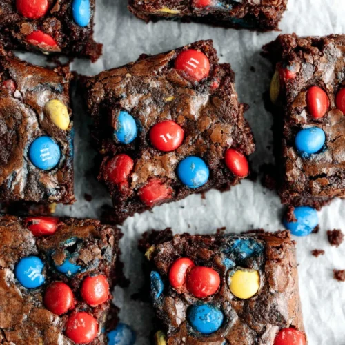 Fudgy brownies with colorful M&Ms, crackly top, rich chocolate texture