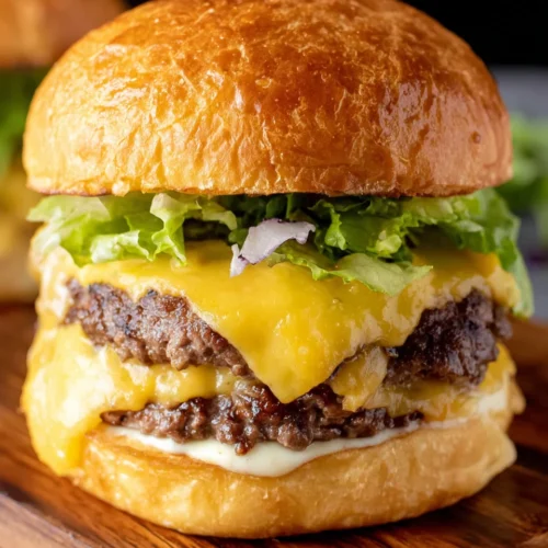 Juicy smash burger with melted cheese and fresh toppings on a brioche bun