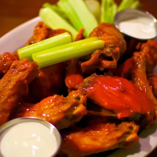 Buffalo Wild Wings medium wing sauce copycat recipe with crispy wings and celery