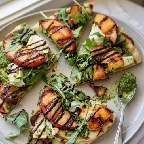 grilled flatbread with peaches and arugula pesto featured image