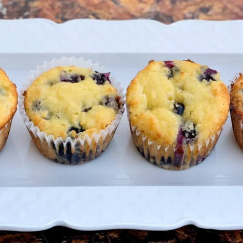 keto low-carb easy sugar-free blueberry breakfast muffins on white platter