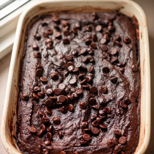 Fudgy sweet potato brownies with chocolate chips in a baking dish